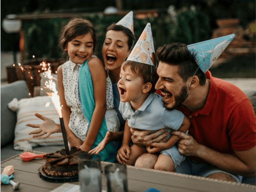 Family celebrating child's birthday 